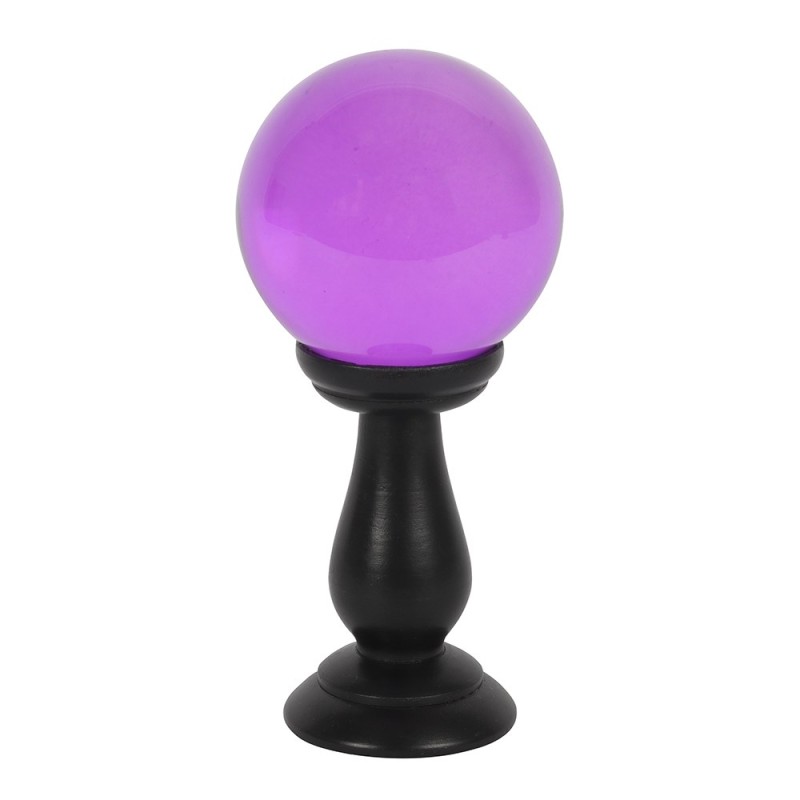 Pequeña bola de cristal violeta en soporte